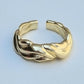 ANILLO CHAPA DE ORO AJUSTABLE ONDAS TRENZADAS