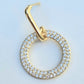 ARETE REDONDO CHAPA DE ORO LARGO CON ZIRCONIA