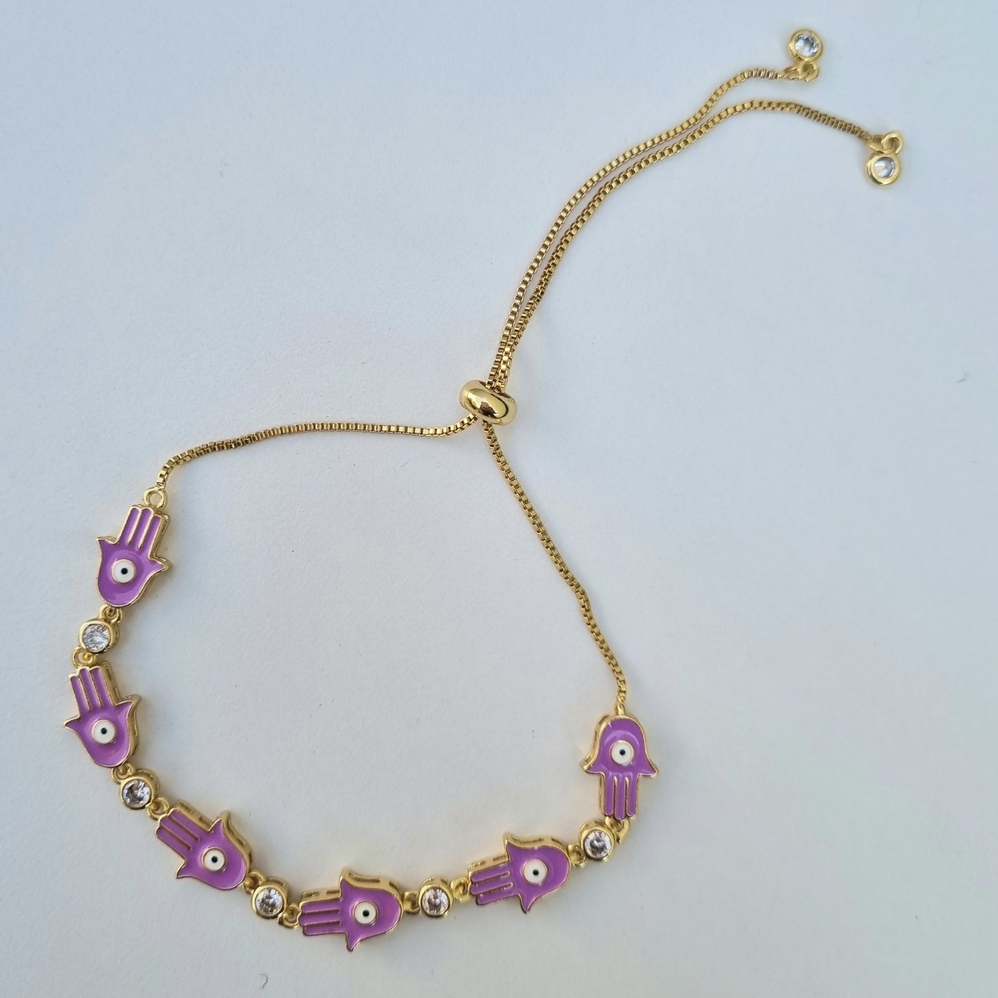 PULSERA CHAPA DE ORO MANITA ESMALTADA CON OJO DIFETENTES COLORES