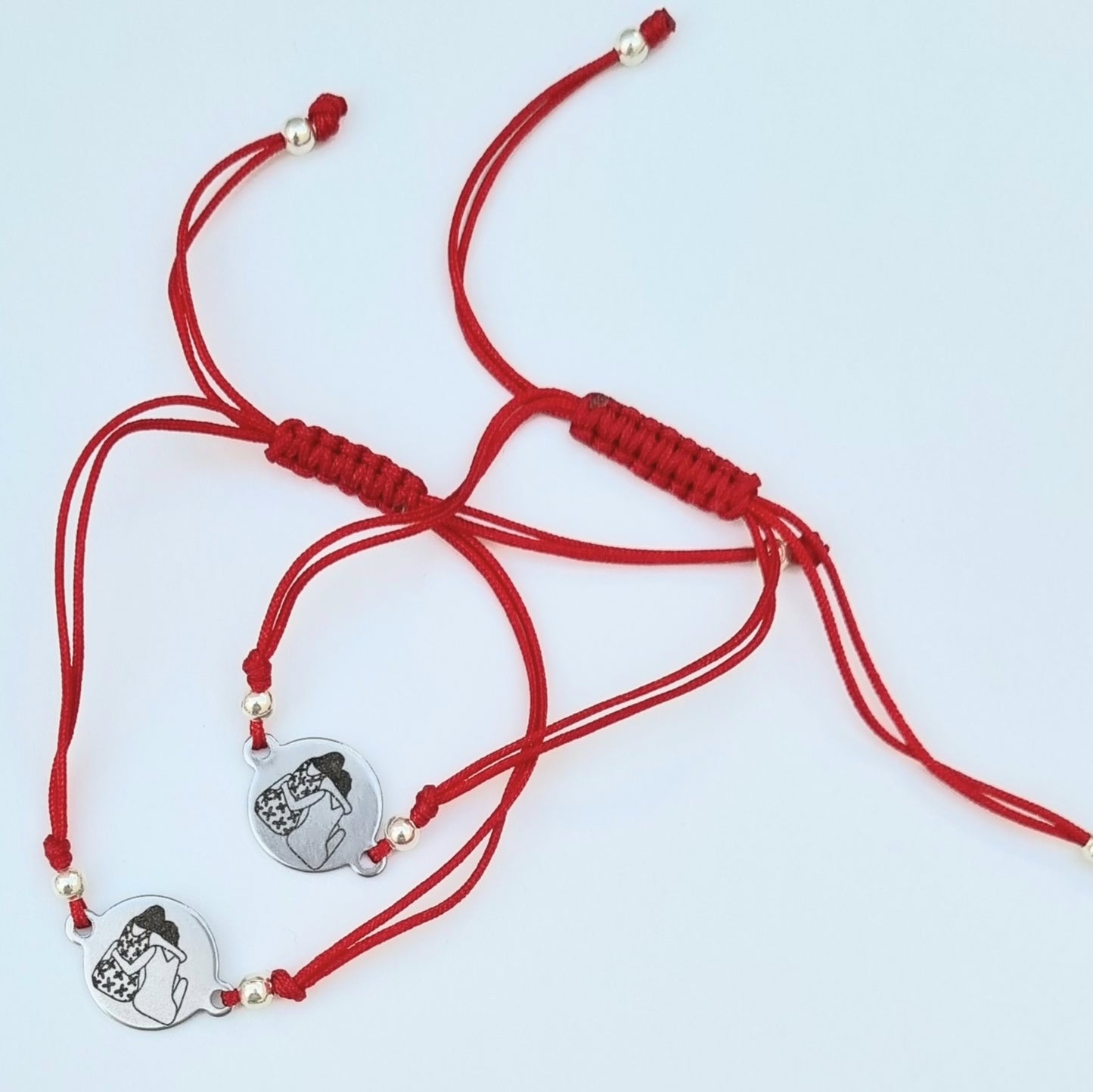 DUO DE PULSERAS AMOR Y LA AMISTAD ROJAS CON DIJE DE ACERO INOXIDABLE