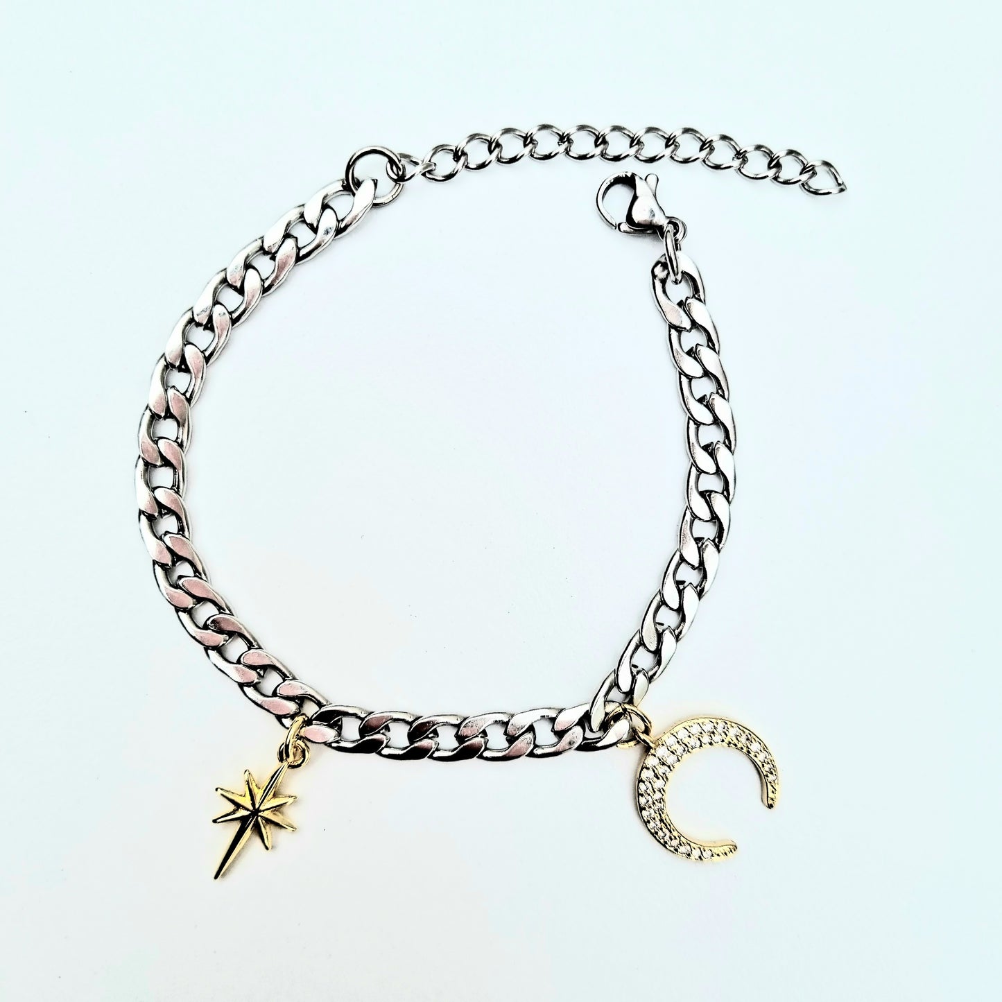 PULSERA LUNA CON ESTRELLA EN ACERO BITONO